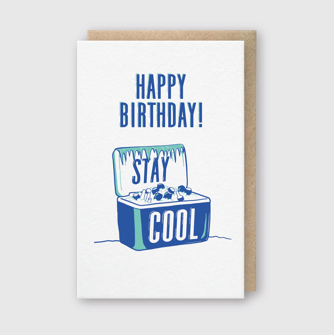 The "Happy Birthday Cooler Greeting Card" showcases an illustration of an open cooler filled with ice and bottles, all set against a brown paper background. To add an eco-friendly touch, it comes with a Recycled Kraft Envelope.