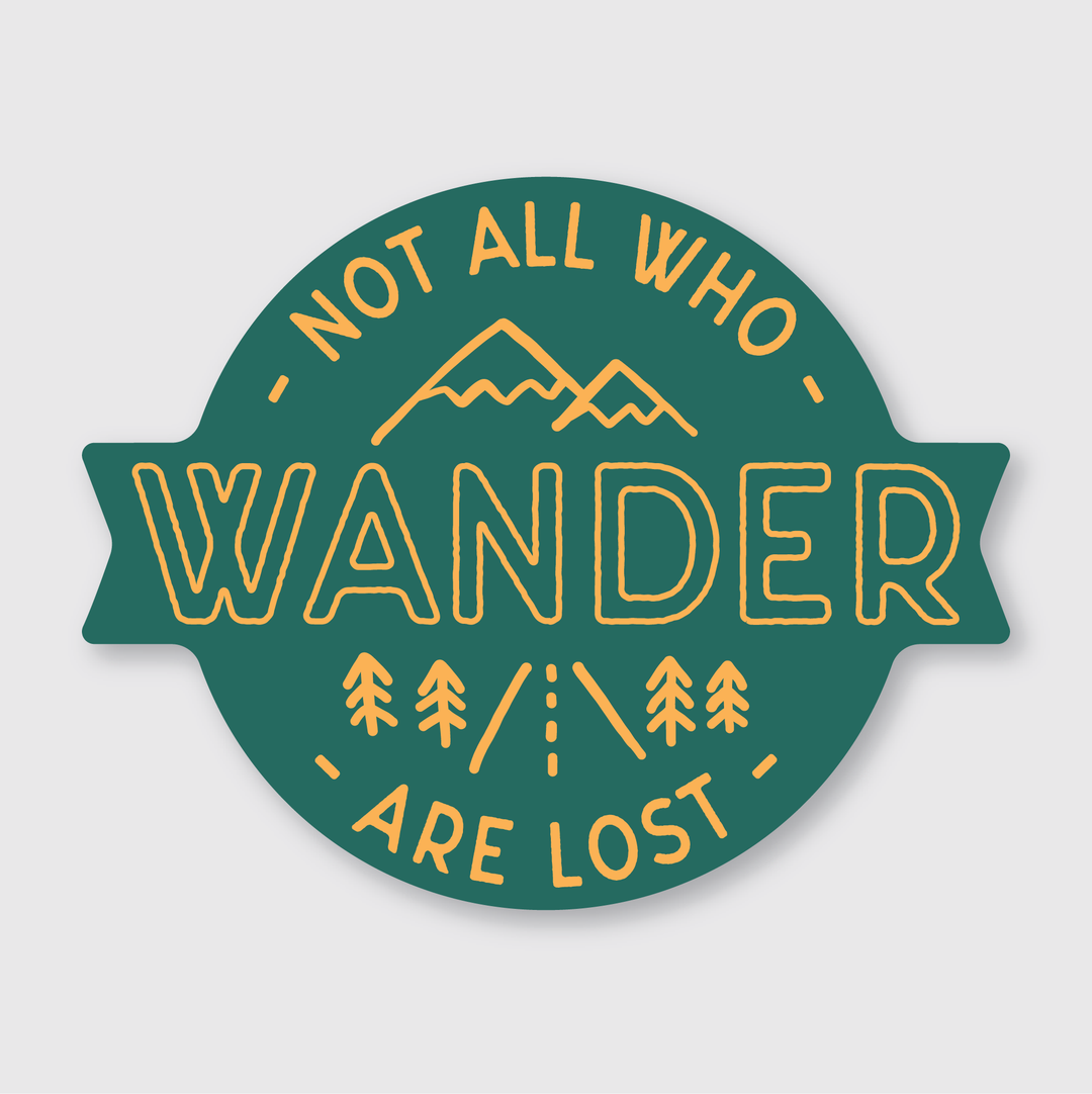 The "Not All Who Wander Sticker" is a circular green vinyl sticker featuring orange text that reads, "Not all who wander are lost." The design includes illustrations of mountains, trees, and a road. It is crafted to be weather-resistant for enhanced durability.