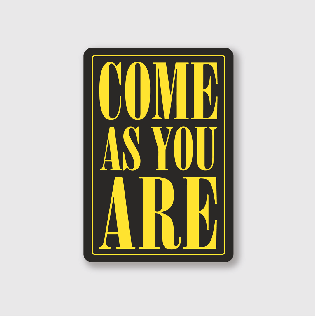 Introducing the "Come As You Are" Sticker, featuring a high-quality vinyl composition with a sleek black background and bold yellow text that reads, "COME AS YOU ARE." This sticker is designed to be water and weather resistant, ensuring it remains durable in any condition.