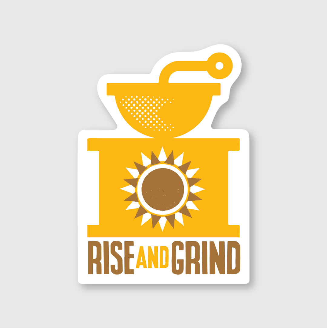 A yellow and brown graphic of a coffee grinder with a sunburst design in the center is showcased. Beneath it, "RISE AND GRIND" is boldly displayed. This high-quality vinyl sticker is expertly die-cut, bringing an energizing touch to your collection.