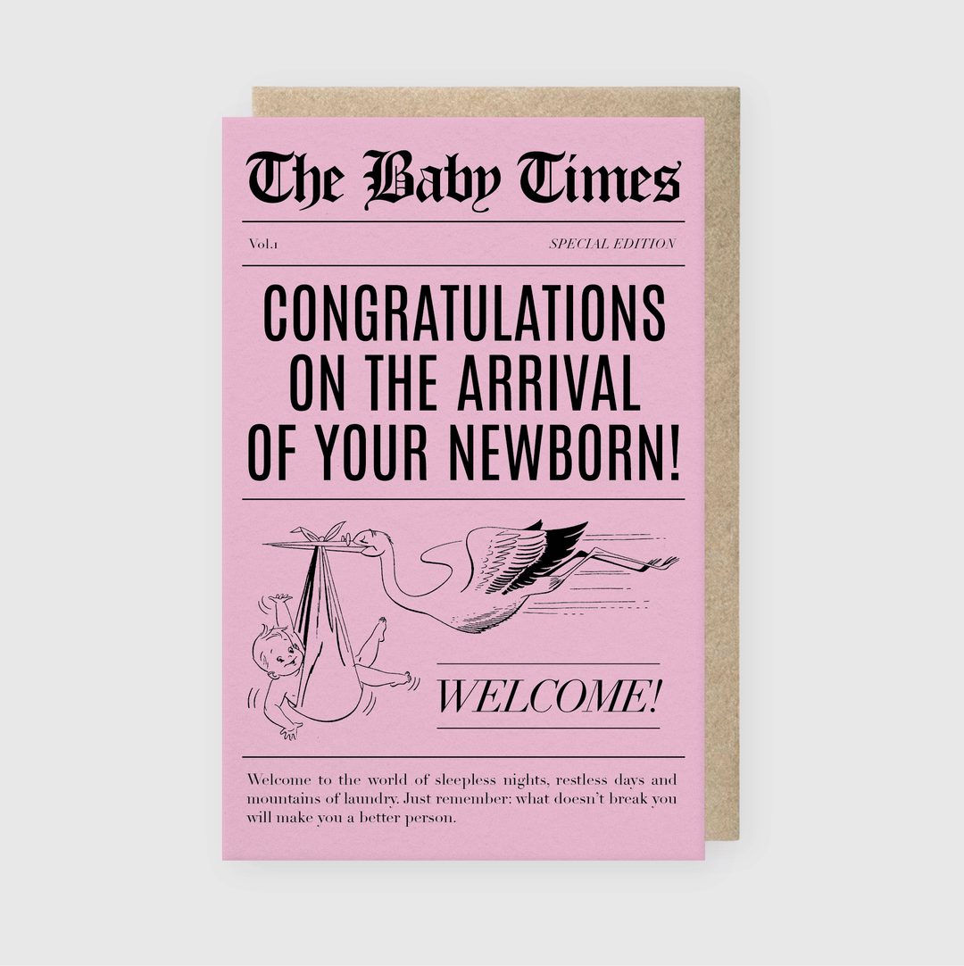 The Baby Times Pink Greeting Card by Pike Street Press is uniquely crafted to resemble a newspaper front page. It features the cheerful headline "Congratulations on the arrival of your newborn!" Accompanied by an illustration of a stork carrying a baby, the card offers playful advice for new parents, adding a touch of humor and warmth to celebrate this special occasion.