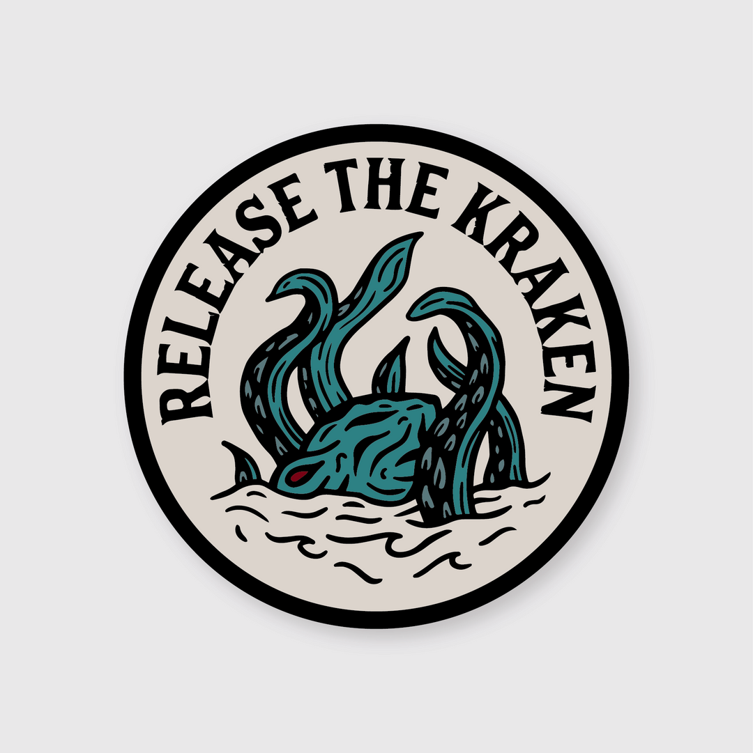 The "Release The Kraken Sticker" features a captivating illustration of a kraken with its tentacles emerging from the water within a circular emblem. Encircled by the bold phrase "Release the Kraken," it's set against a light gray background, making it ideal for custom stickers.
