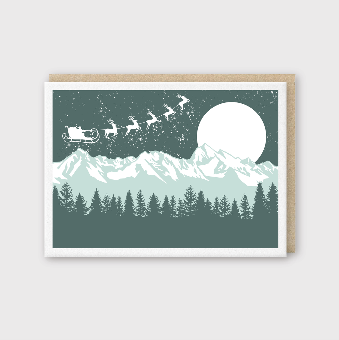 Santa Over Mountains Greeting Card