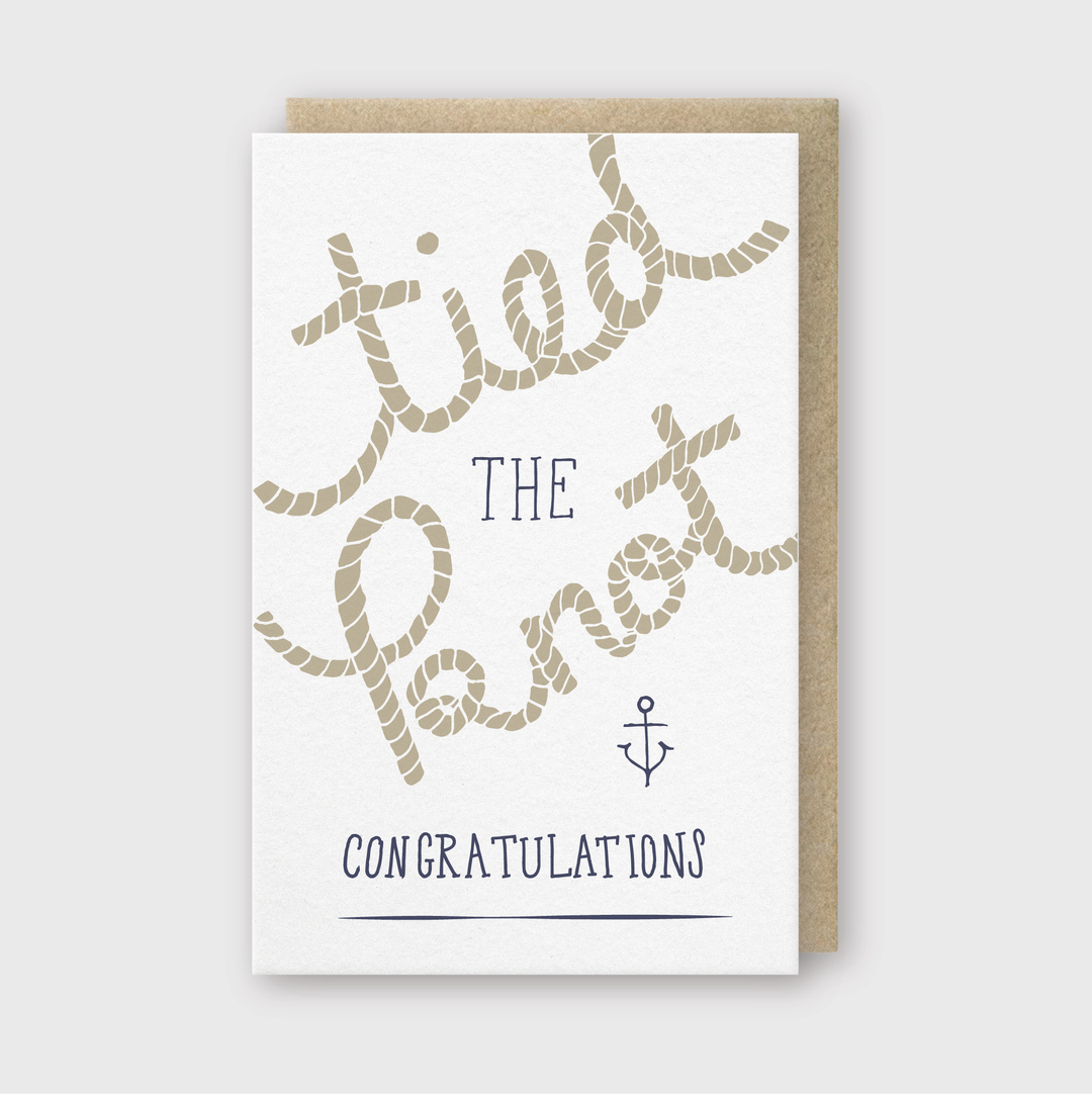 The "Tied the Knot Greeting Card" features rope lettering for the phrase "tied the knot" paired with an anchor illustration, and has "congratulations" elegantly displayed below. It comes with a light brown envelope.