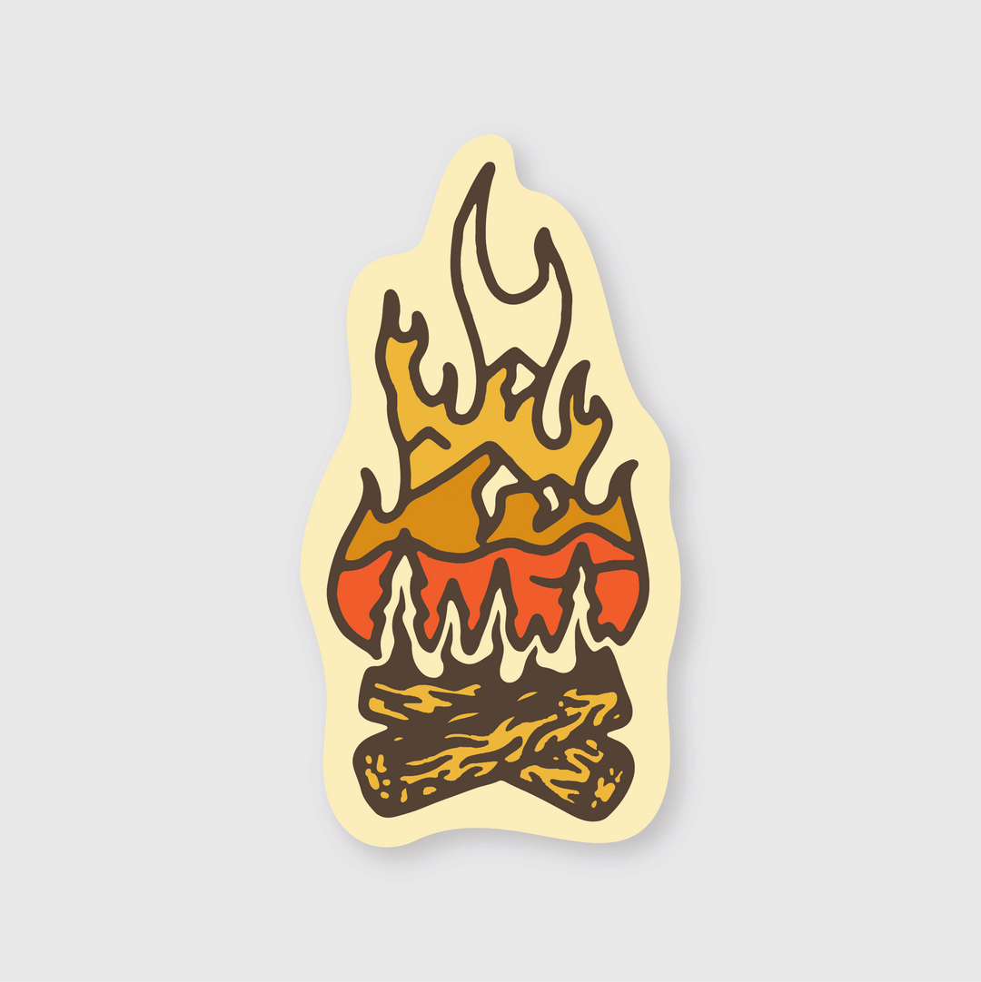 Introducing the Campfire Mountain Sticker: This die-cut vinyl sticker showcases a unique design where logs and flames morph into mountains and trees, ideal for those who love the outdoors. Made in warm hues of orange, yellow, and brown on a light background, it is designed to withstand various weather conditions for any adventure.