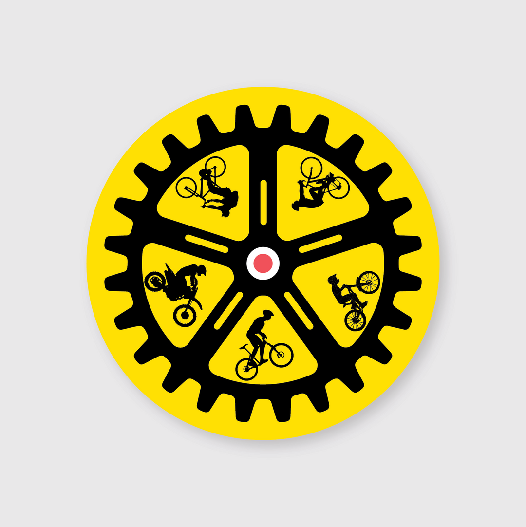 The Bike Cog Sticker features a vibrant yellow gear with black silhouettes of cyclists performing stunts against a subtle gray backdrop. At its center, there's an eye-catching red and white circle, making it an ideal accessory for cycling enthusiasts.