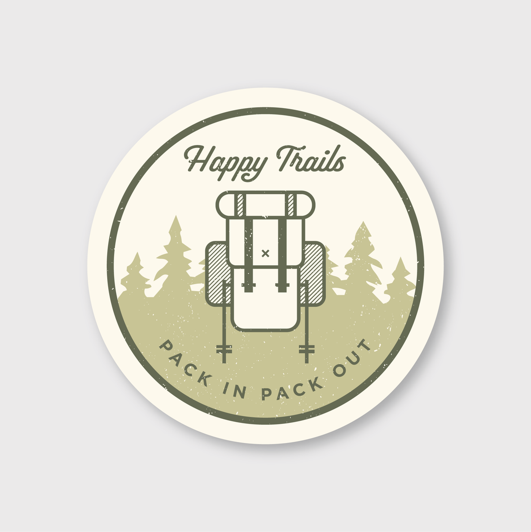 The Happy Trails Hike Sticker features a vintage circular design showcasing a backpack and trees. The phrase "Happy Trails" is prominently displayed at the top, with "Pack In Pack Out" at the bottom, all in earthy green tones. It's perfect for outdoor enthusiasts.