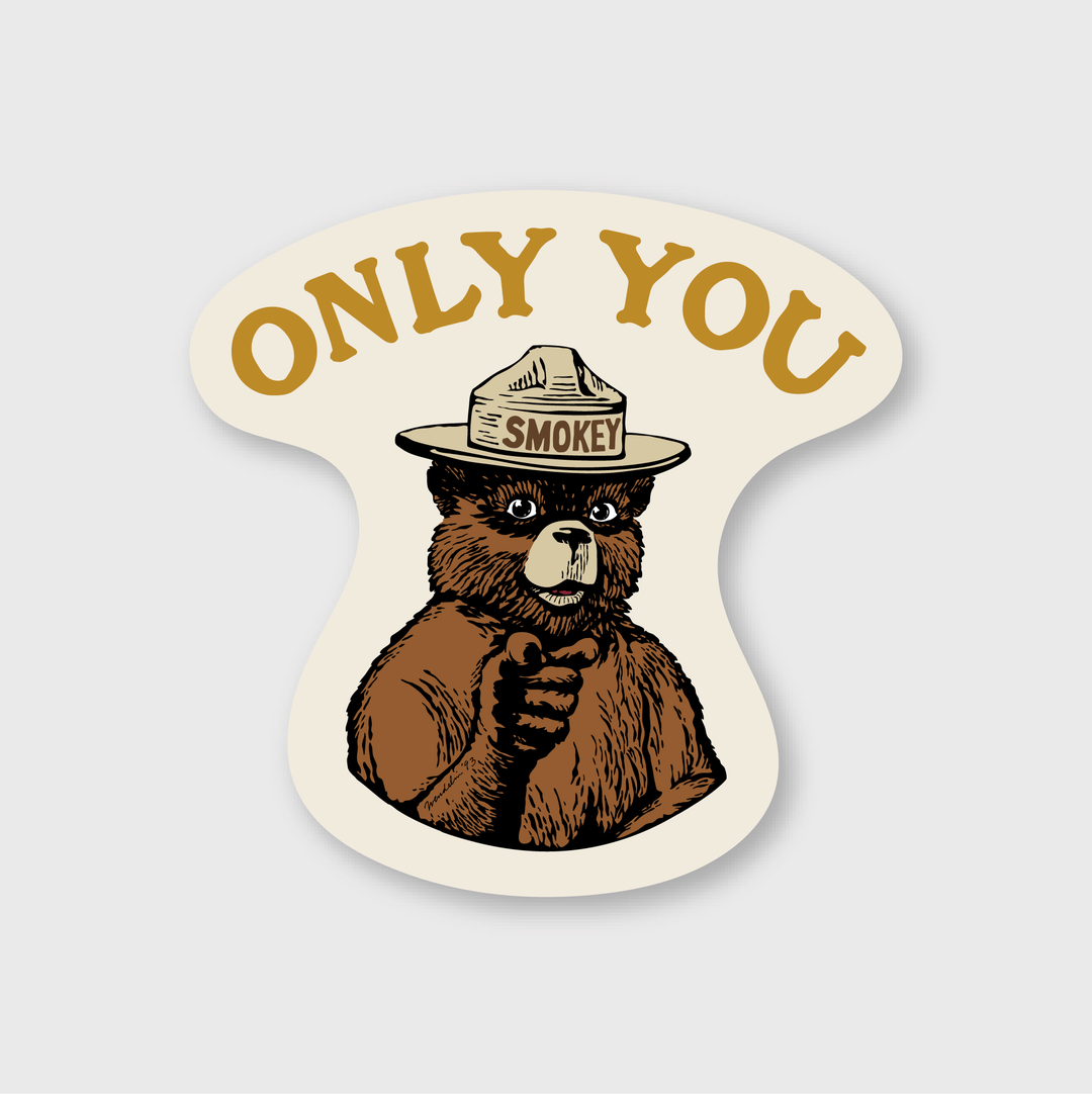 The Smokey Bear Only You Point Sticker features an illustration of a bear in a ranger hat labeled "Smokey," pointing forward with a serious expression. The text "ONLY YOU" appears above, conveying responsibility. This sticker is weather-resistant.