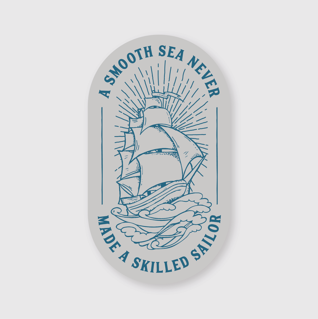 This vinyl sticker features the artwork of a sailing ship navigating turbulent waves, with illuminating rays behind. It perfectly embodies the spirit of adventure with its inspiring message: "A smooth sea never made a skilled sailor." Expertly designed, the Smooth Sea Skilled Sailor Sticker captures the essence of resilience and exploration, regardless of weather conditions.
