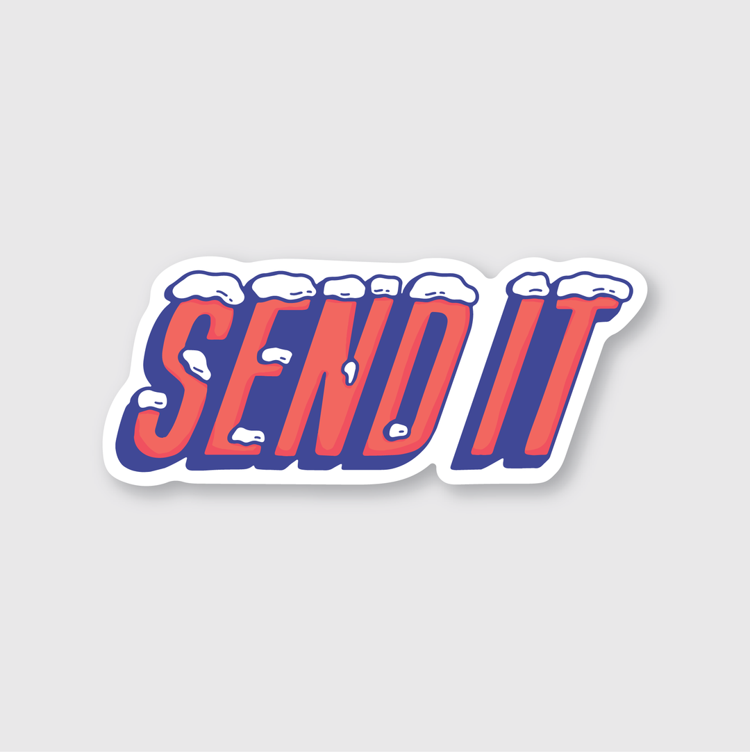 The "Send It Sticker" features stylized text reading "SEND IT" in red and blue with a snowy effect on top. This die-cut vinyl sticker showcases letters with a 3D appearance in a bold, dynamic font set against a light gray background. Designed by artists, it offers water and weather resistance for long-lasting appeal.