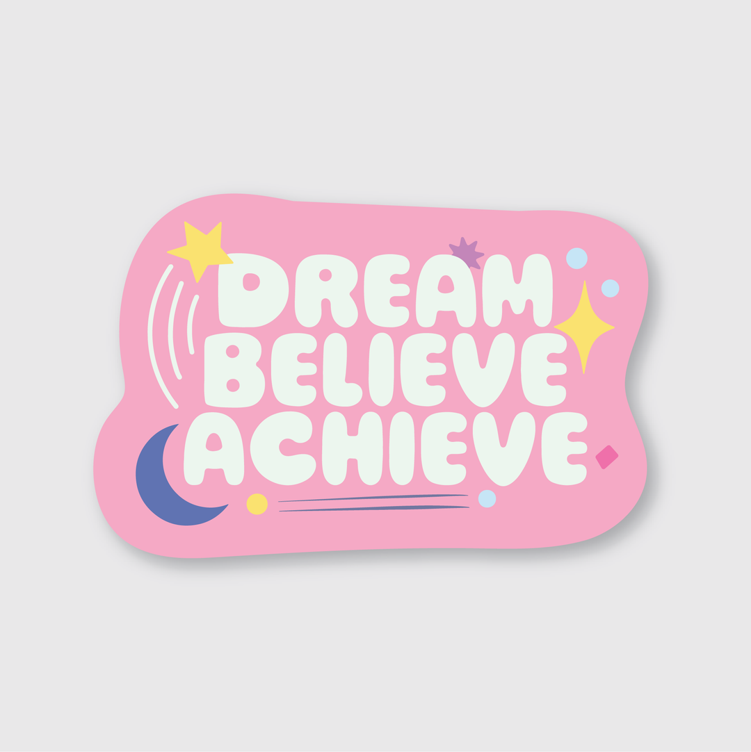 The "Dream Believe Achieve" sticker is a pink die-cut vinyl sticker featuring bold white letters. It includes colorful stars, a crescent moon, and small decorative dots, all contributing to its artistic design. This weather-resistant sticker offers lasting inspiration.