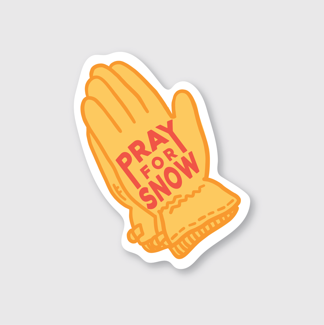 An illustration of yellow winter gloves with bold red words "Pray For Snow" captures the essence of a Seattle winter and would make high-quality stickers. The design features a light gray background, adding to its visual appeal.