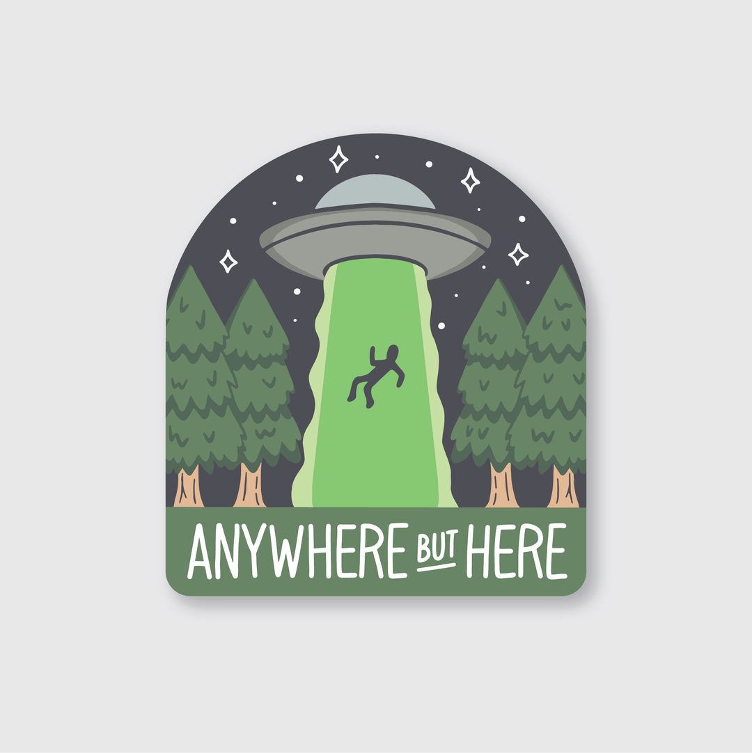 The "Anywhere But Here UFO Sticker" showcases a playful cartoon design of a UFO with a green beam lifting someone into the sky, framed by tall pines beneath a starry night. The sticker includes the phrase "ANYWHERE BUT HERE" and is crafted as a die-cut vinyl piece in Seattle, ideal for adding a personal touch to various spaces.