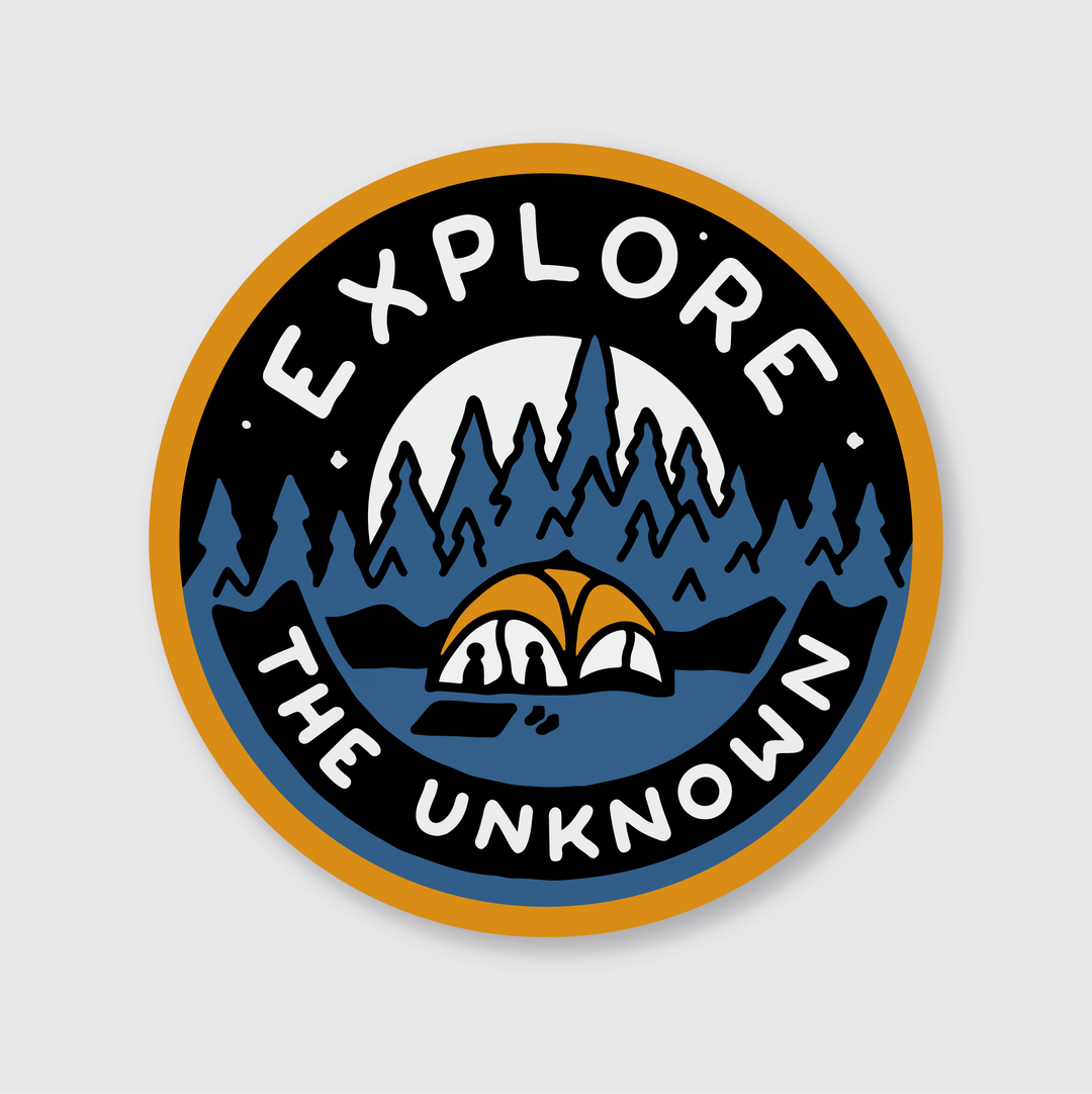 This circular sticker features the phrase "Explore the Unknown" along with an illustration of a tent surrounded by trees under a full moon. The design incorporates dark blue, orange, and white colors set against a black background with an orange border. Made from die-cut vinyl, it is both water and weather resistant, making it a great way to support independent artists.
