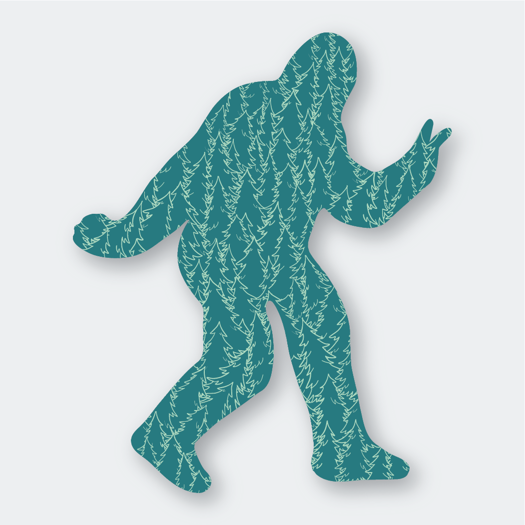 The Sasquatch Sticker showcases a silhouette of a Bigfoot-like creature, creatively filled with images of evergreen trees. This design offers a textured and natural feel, set against a plain white background, encapsulating a wild essence in a fashionable die-cut vinyl sticker.