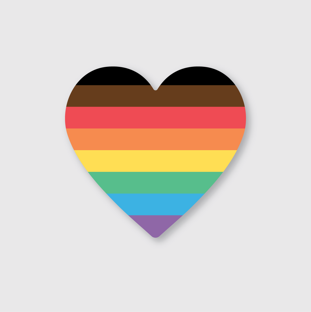 The Pride Sticker features a heart-shaped design with the inclusive Pride flag colors: black, brown, red, orange, yellow, green, blue, and purple. It emphasizes diversity and inclusion on a light gray background and captures the spirit of Seattle with expert craftsmanship.