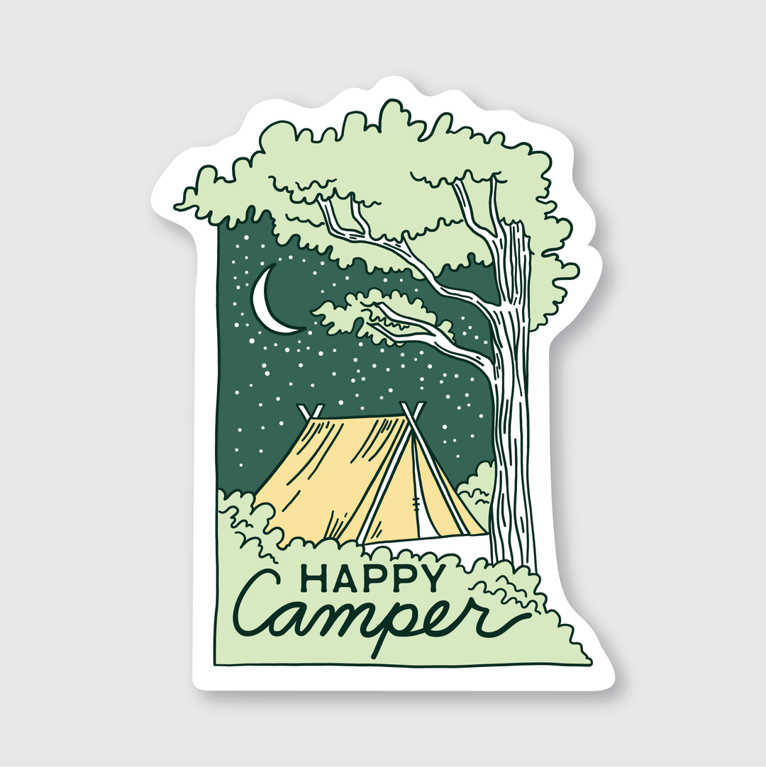 Illustration of a campsite at night features a cozy tent under a starry sky and crescent moon, framed by an impressive large tree. The text "Happy Camper" is elegantly written below, creating the perfect design for an outdoor-themed vinyl sticker.