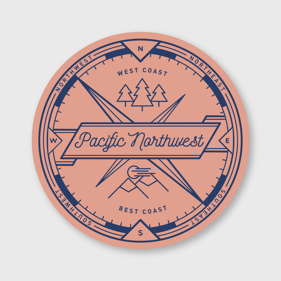 Experience the spirit of Seattle with the Pacific Northwest Compass Sticker by Pike Street Press. This design features compass directions and icons of trees and mountain peaks, along with the phrase "West Coast Best Coast." It's set against a peach background with navy-blue design elements, capturing the essence of the region beautifully.