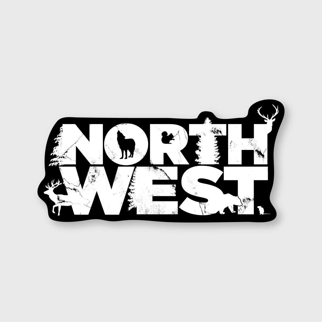 The Northwest Sticker is designed with bold white letters on a black background, featuring integrated silhouettes of animals and trees. It is made from high-quality, weather-resistant die-cut vinyl, ensuring durability.