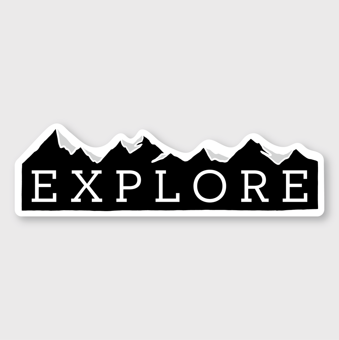 The Explore Mountain Sticker features bold white lettering saying "Explore" against a black silhouette of a mountain range on a light gray background. This design is perfect for adventure enthusiasts and ensures outdoor durability.