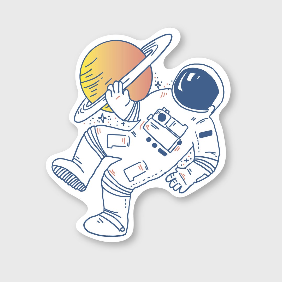 Experience a cosmic adventure with the Astronaut Sticker by Pike Street Press. This high-quality vinyl sticker showcases an intricate illustration of an astronaut floating through space, holding a ringed planet. Featuring detailed suit patches and a sleek helmet design, it’s ideal for any space enthusiast. Set against a light gray backdrop, this die-cut sticker beautifully captures the wonders of space exploration.