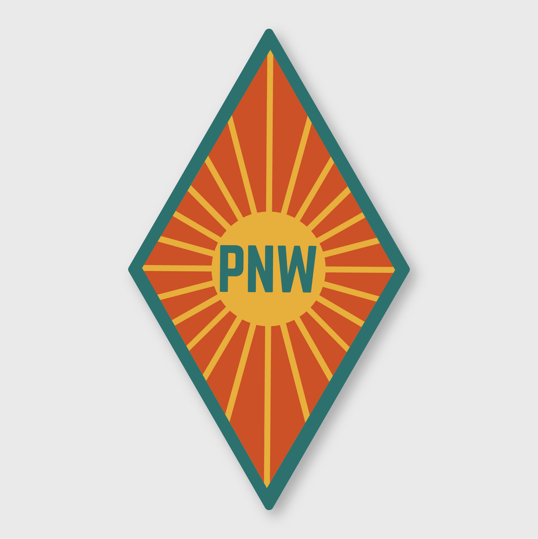 The PNW Sunburst Sticker is a diamond-shaped badge with an orange background and a yellow sunburst design. It features bold green letters "PNW" at its center and is completed with a teal border, subtly reflecting the vibrant spirit of Seattle.