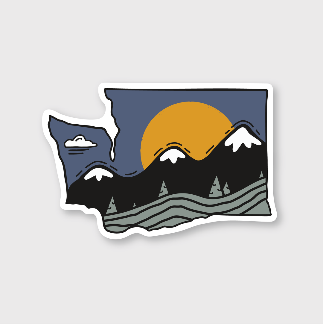 This description is about a die cut vinyl sticker showcasing the Washington State landscape. The design features snow-capped mountains and evergreen trees, all set against a dark blue sky. A large orange sun adds warmth to this outdoor-rated sticker.