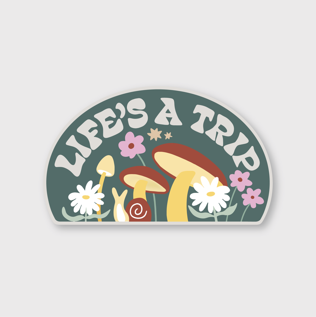 The "Life's A Trip" sticker features a delightful design of mushrooms and flowers, created by skilled artists. This charming piece is crafted by Pike Street Press, highlighting the intricate artistry involved.