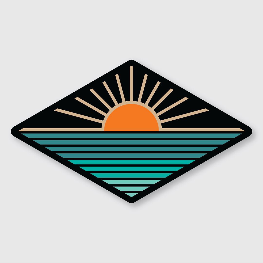 The Sunset Diamond Sticker features a distinctive diamond-shaped design showcasing an orange sun either setting or rising over a teal, striped sea against a black background. The design is accented by minimalist sun rays extending upward, offering a geometric and stylized appearance. Made from weather-resistant vinyl, this sticker is designed by skilled artists.