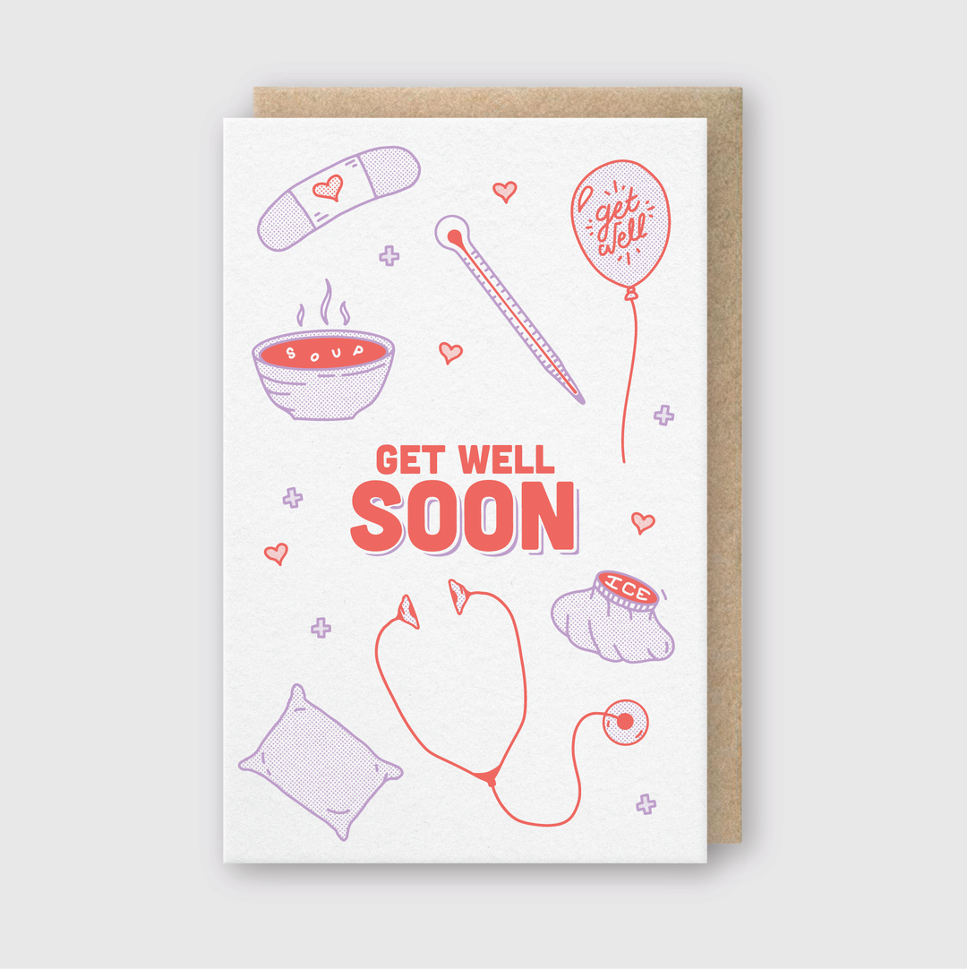 The "Get Well Soon" Greeting Card showcases charming illustrations of comforting items like a soup bowl, thermometer, stethoscope, ice pack, heart-adorned bandage, pillow, and cheerful balloon. This handcrafted card is thoughtfully packaged with a brown envelope.