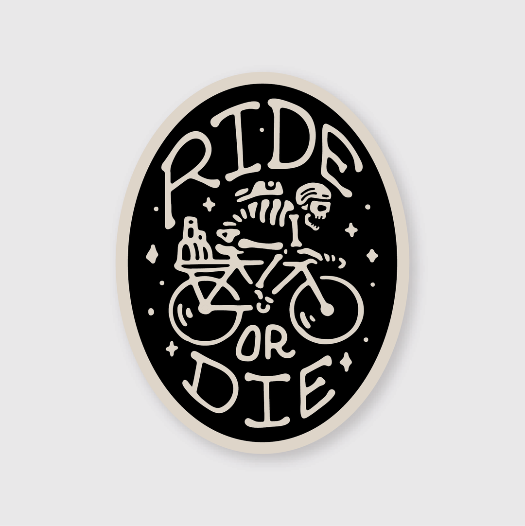 This vintage-style sticker features a black-and-white illustration of a skeleton riding a bicycle, embellished with stars and decorative elements. The bold "Ride or Die" lettering captures the rebellious spirit, making it an ideal accessory.