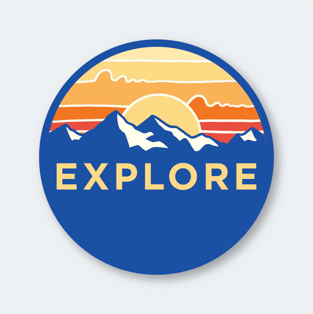 Introducing the "Explore Sunset Sticker." This die-cut vinyl sticker features a circular badge design with a stylized mountain range and sunset in the background. The word "EXPLORE" is prominently displayed in bold yellow letters against a blue foreground. Made from high-quality vinyl, it showcases vibrant orange and yellow hues, making it ideal for outdoor adventures.