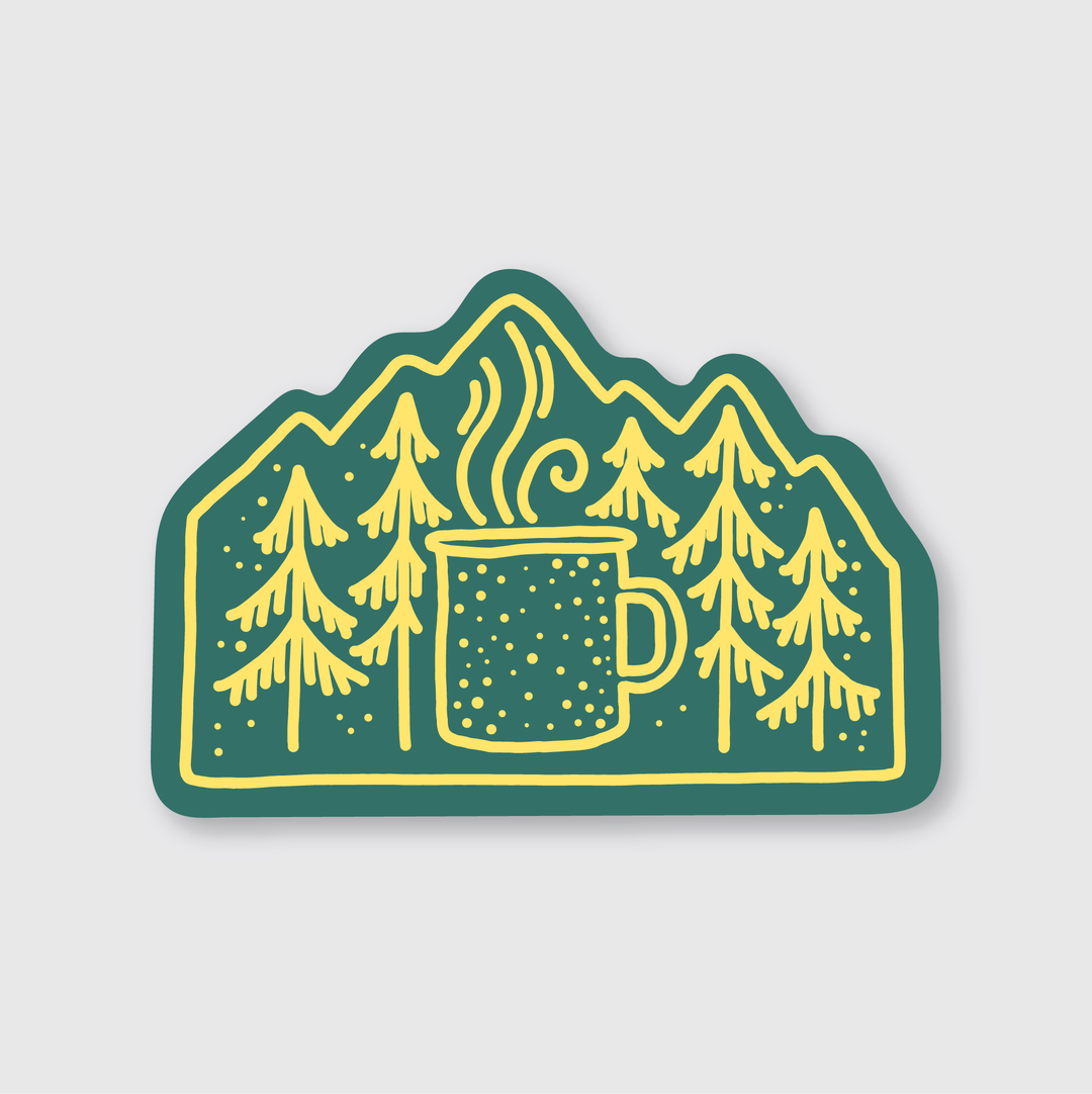 The Camper Coffee Sticker showcases a steaming mug with stylized mountains and pine trees in the background, all in a green and yellow color scheme. It's ideal for camper coffee enthusiasts who enjoy an outdoor-rated die-cut vinyl sticker.